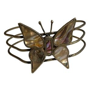 Abalone shell butterfly bracelet three prong band silver plated adjustable band.